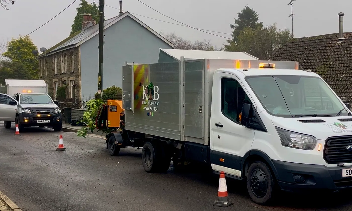 KB Trees and Grounds purpose-built vehicles and wood chipper on site